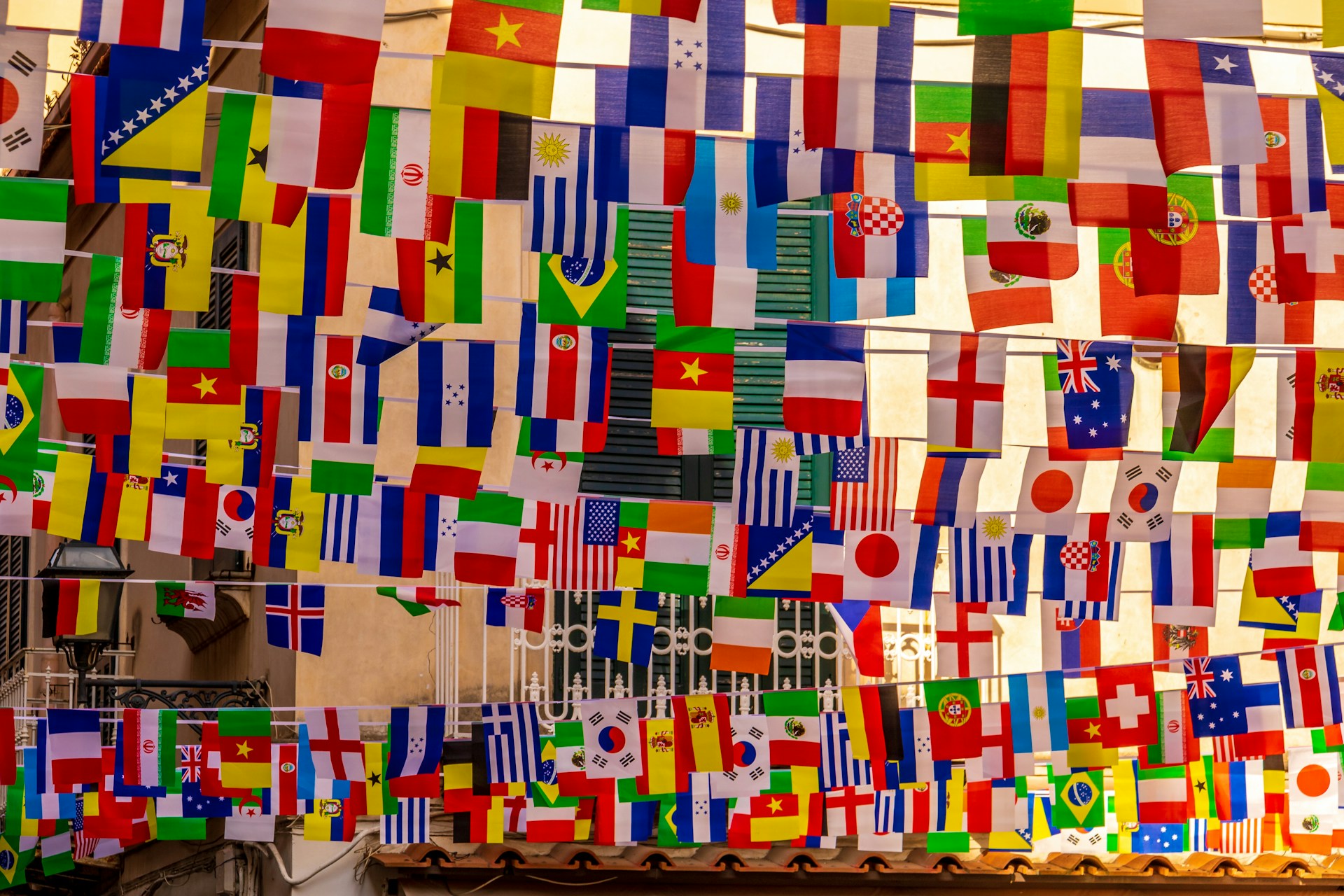 World flags hanging from bunting