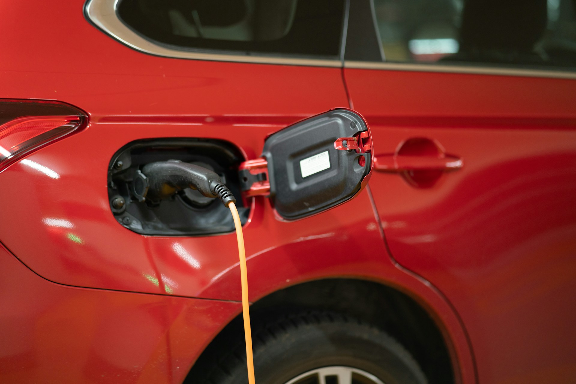 Electric car at charging station