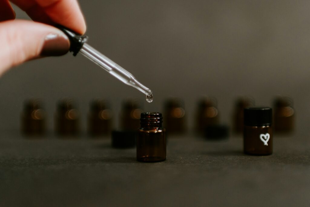 Essential oil in glass bottle