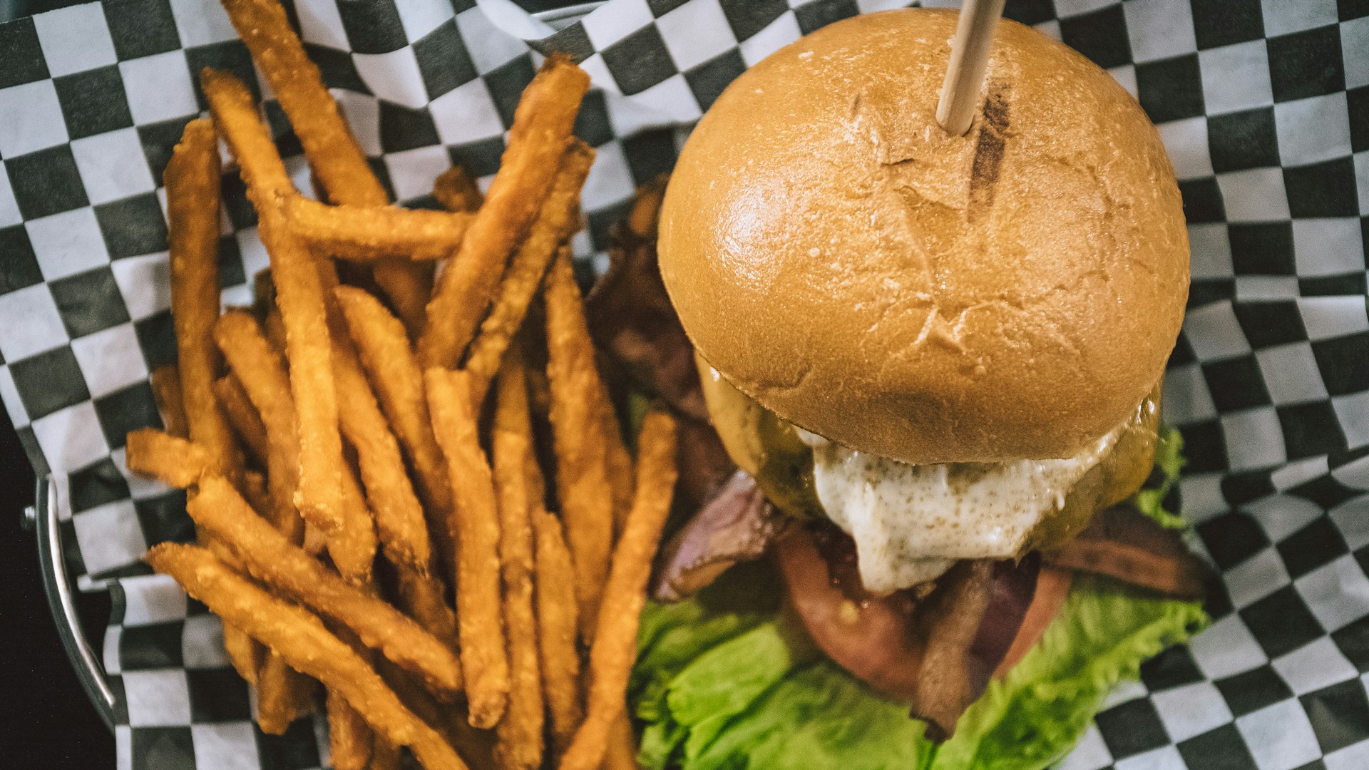 burger and fries in basket