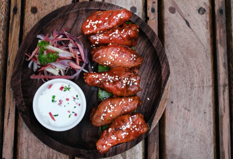 chicken wings with dip and garnish