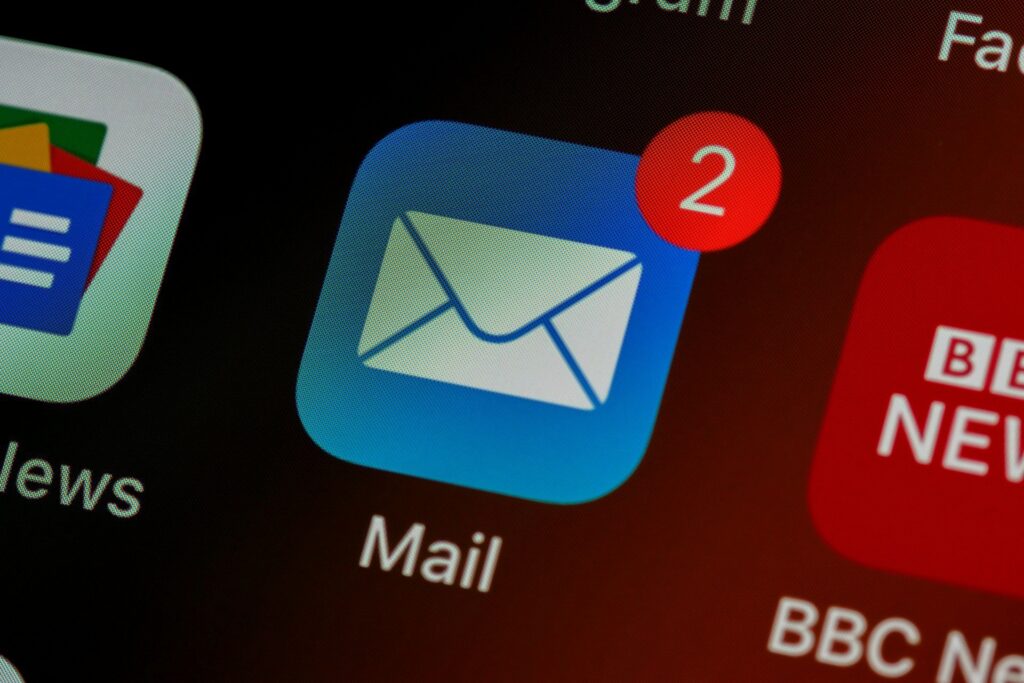 An email icon on a phone, with two notifications